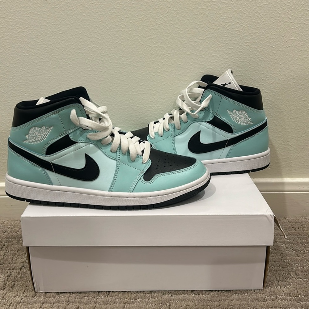Air Jordan Mids Teal and Black from Stock X